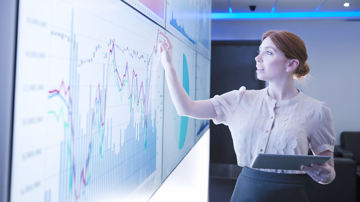 woman using big screen chart